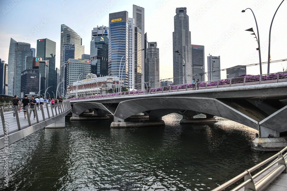 Marina Bay Waterfront in Singapore, featuring Marina Bay Sands, lotus-shaped ArtScience Museum and Helix Bridge Marina Bay Waterfront in Singapore, featuring Marina Bay Sands, lotus-shaped ArtScience Museum and Helix Bridge