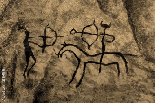 image of ancient hunters on the cave wall. ancient history. era, era.