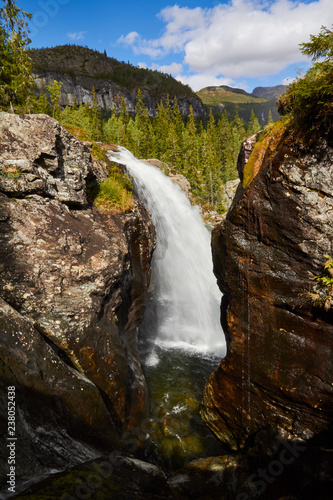 waterfall in the forest, norway, land of waterfalls