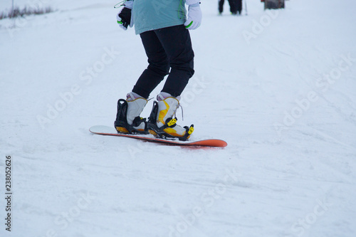 snowboarder rides a snowboard