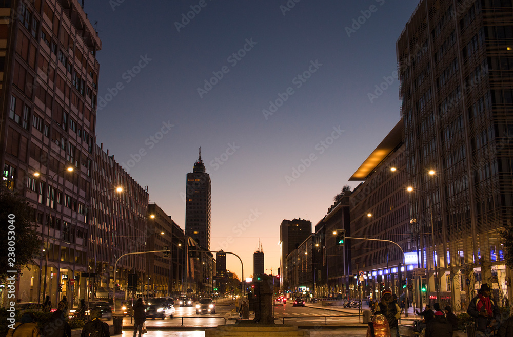 Obraz premium Milan at blue hour, after sunset. Centre of Milan, city of fashion, luxury and business. Italy