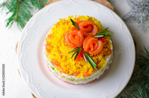 Salmon Salad, Festive Layered Salad with Salmon, Avocado, Rice and Cream Cheese Decorated with Egg Yolk and Salmon Roses, Winter Holidays Appetizer