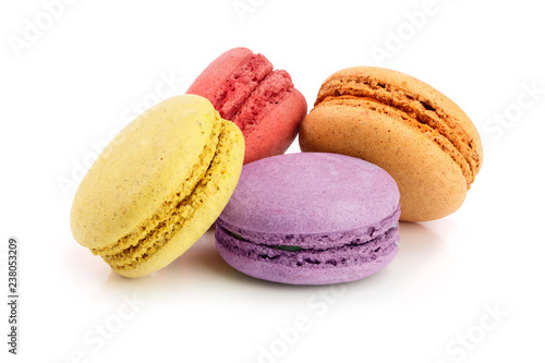four macaroons isolated on white background closeup