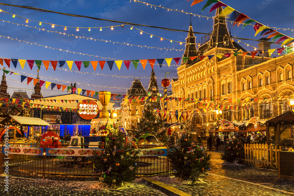 MOSCOW, RUSSIA - DECEMBER 20, 2016: Christmas fair on the Red square in the evening. Moscow, Russia