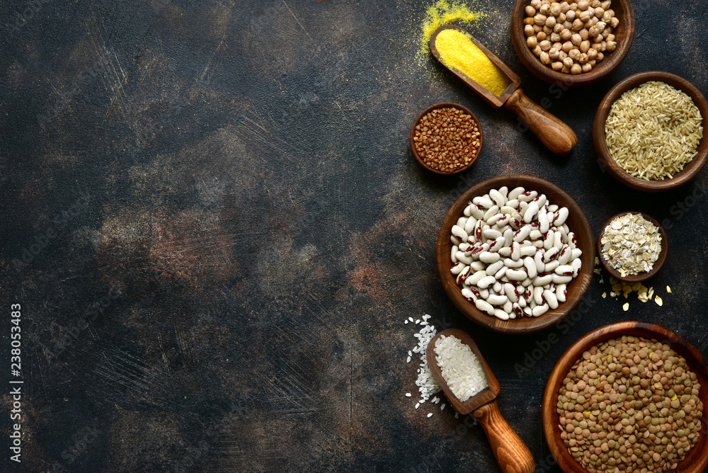 Assortment of grains, cereals and legumes.Top view with copy space.