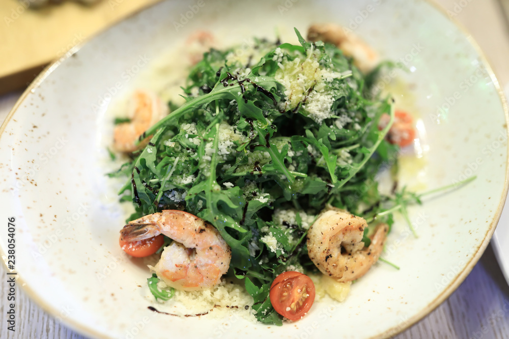 Salad with arugula and shrimps Salad with arugula and shrimps
