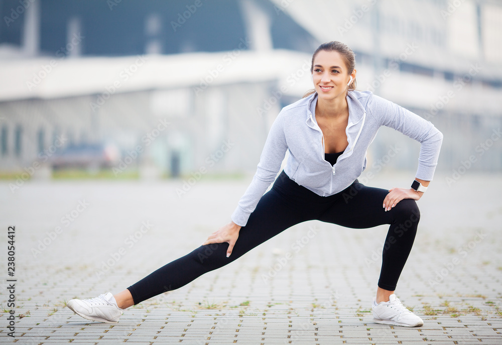 Fototapeta premium Fitness. Athletic women posing and stretching before run