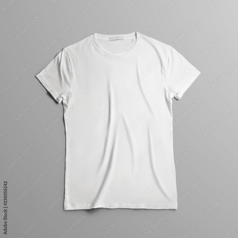 Studio template of clothes with  blank t-shirt lies on the on gray background. - obrazy, fototapety, plakaty 