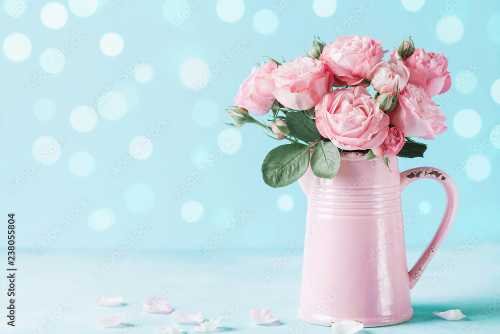 Beautiful rose flowers in pink vase for Womens day or Mothers day greeting card. Beautiful rose flowers in pink vase for Womens day or Mothers day greeting card.