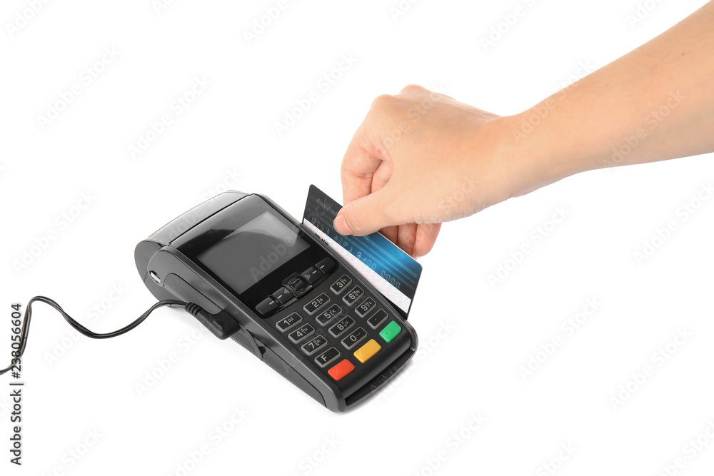 Woman using modern payment terminal on white background, closeup