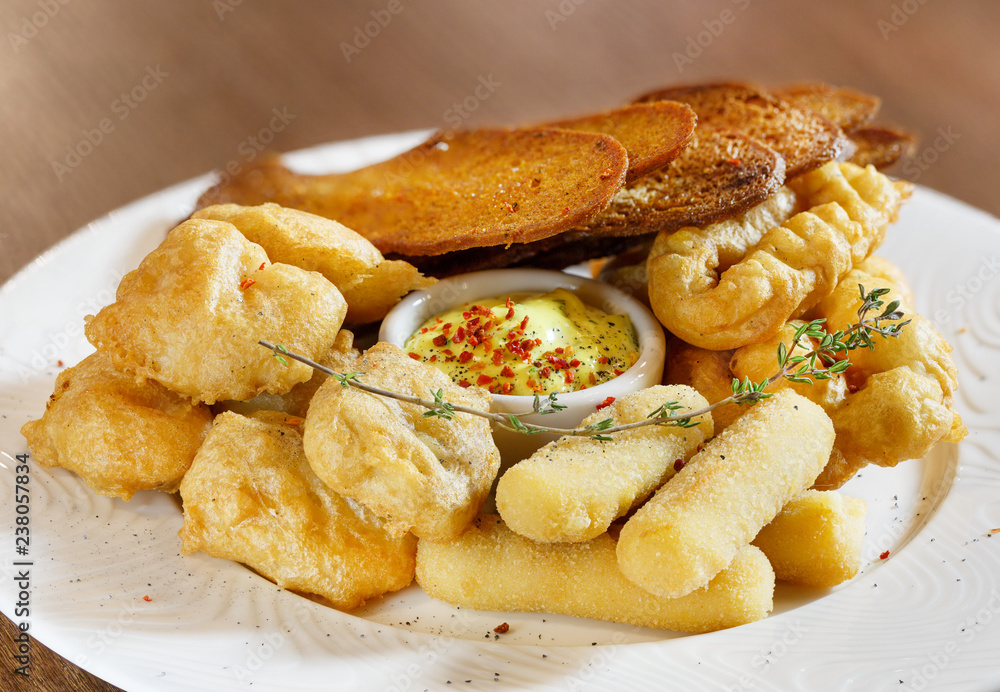 Croutons, cheese and sauce, beer snack Croutons, cheese and sauce, beer snack