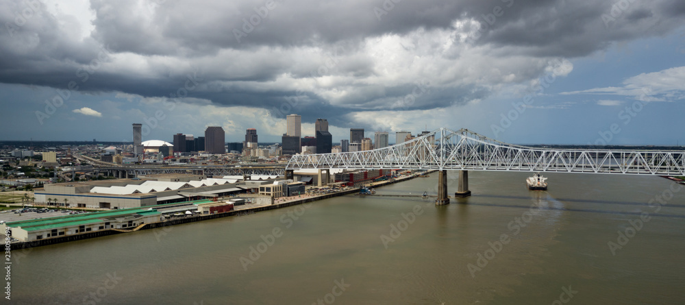 Afternoon Storm Clouds Pass Over Highway Bridges Barges Moving Waterfron New Orleans