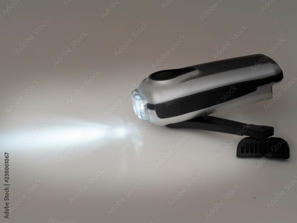 Wind up dynamo torch, flashlight, with light. Photos | Adobe Stock
