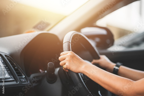 Photos Close Up of Woman Driving a Car on Road - Transportation Concept