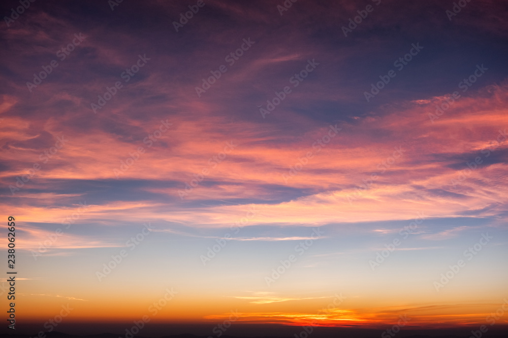 Colorful cloud in blue sky at sunset Colorful cloud in blue sky at sunset