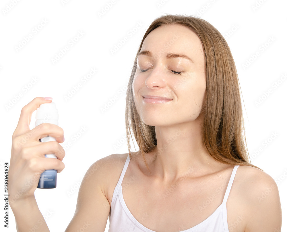 Beautiful woman beauty fashion thermal water spray for face in hand on white background isolation Beautiful woman beauty fashion thermal water spray for face in hand on white background isolation