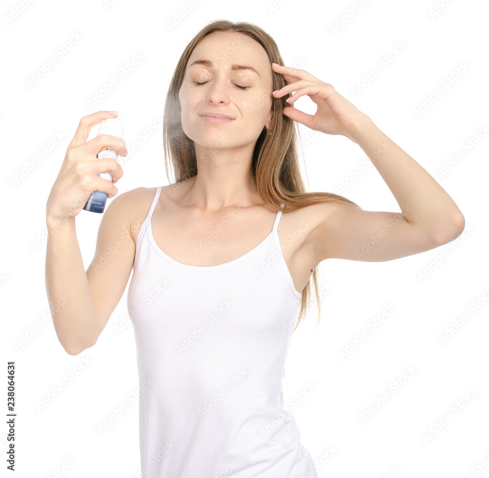 Beautiful woman beauty fashion thermal water spray for face in hand on white background isolation Beautiful woman beauty fashion thermal water spray for face in hand on white background isolation