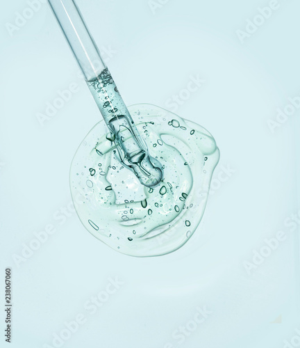 Liquid gel or serum on a screen of microscope  © tatyanarow