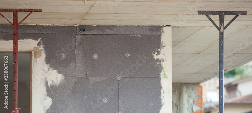Photos External therm insulation for the facade of building.