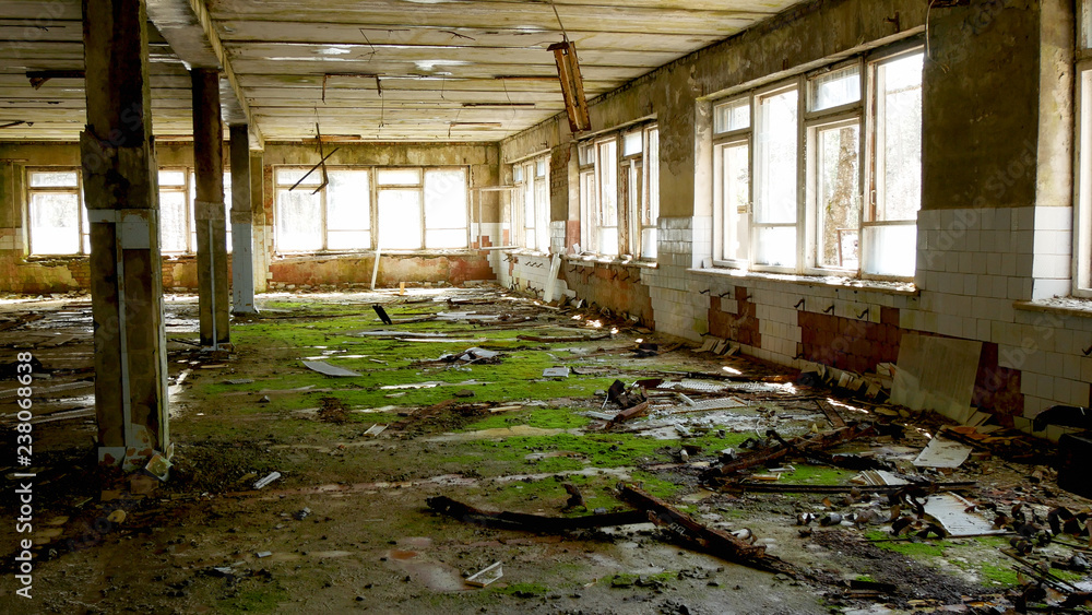 Fototapeta premium Destroyed building in a deserted city after the accident at the Chernobyl nuclear power plant