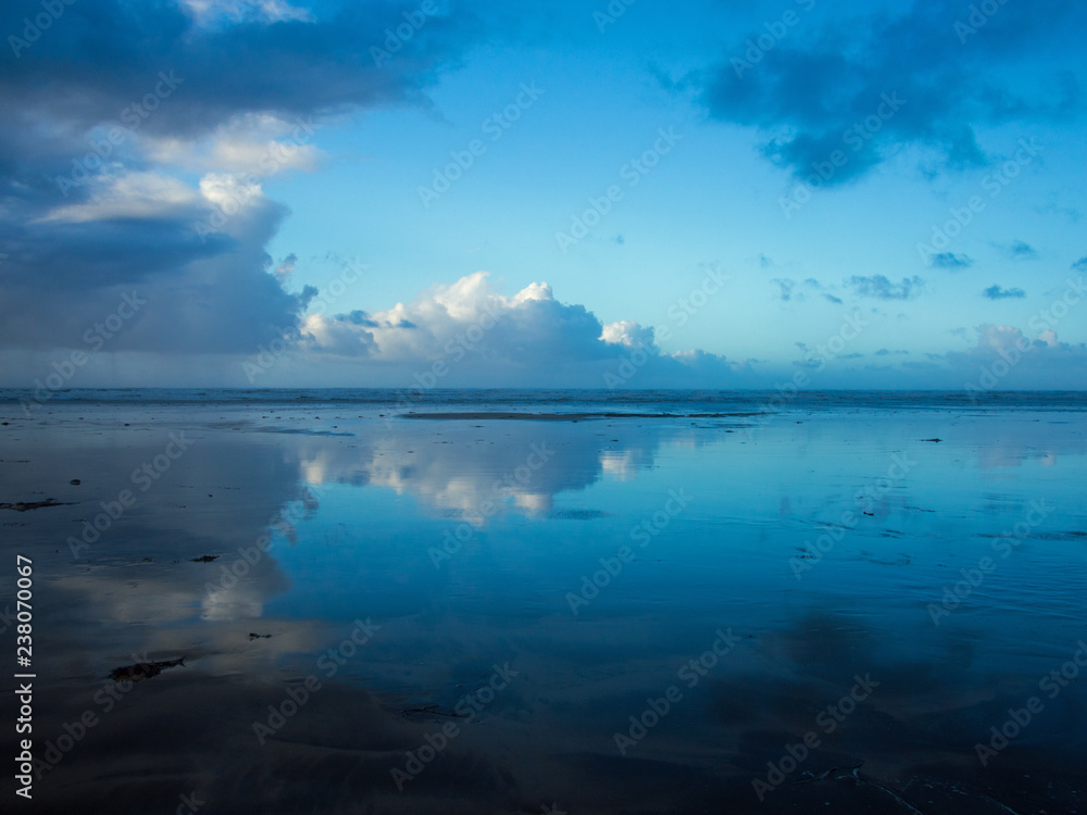 Winter sun at Westward Ho beach with rain clouds fast approaching Winter sun at Westward Ho beach with rain clouds fast approaching