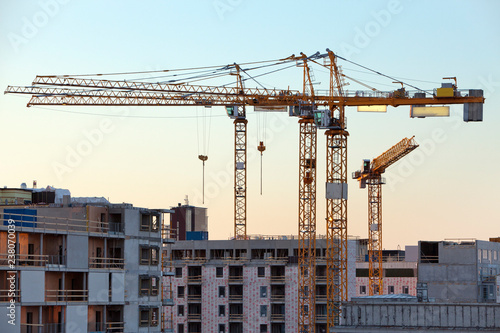 Construction cranes work in Helsinki in winter