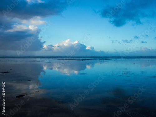 Winter sun at Westward Ho beach with rain clouds fast approaching