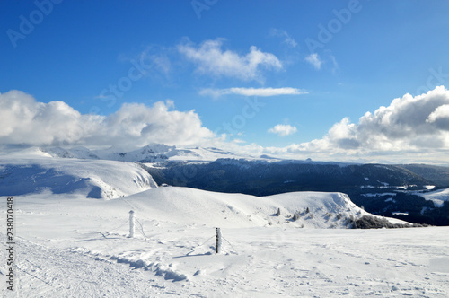 Beautiful winter landscape and viewpoint, with volcanic mountain. Wilderness landscape. Auvergne