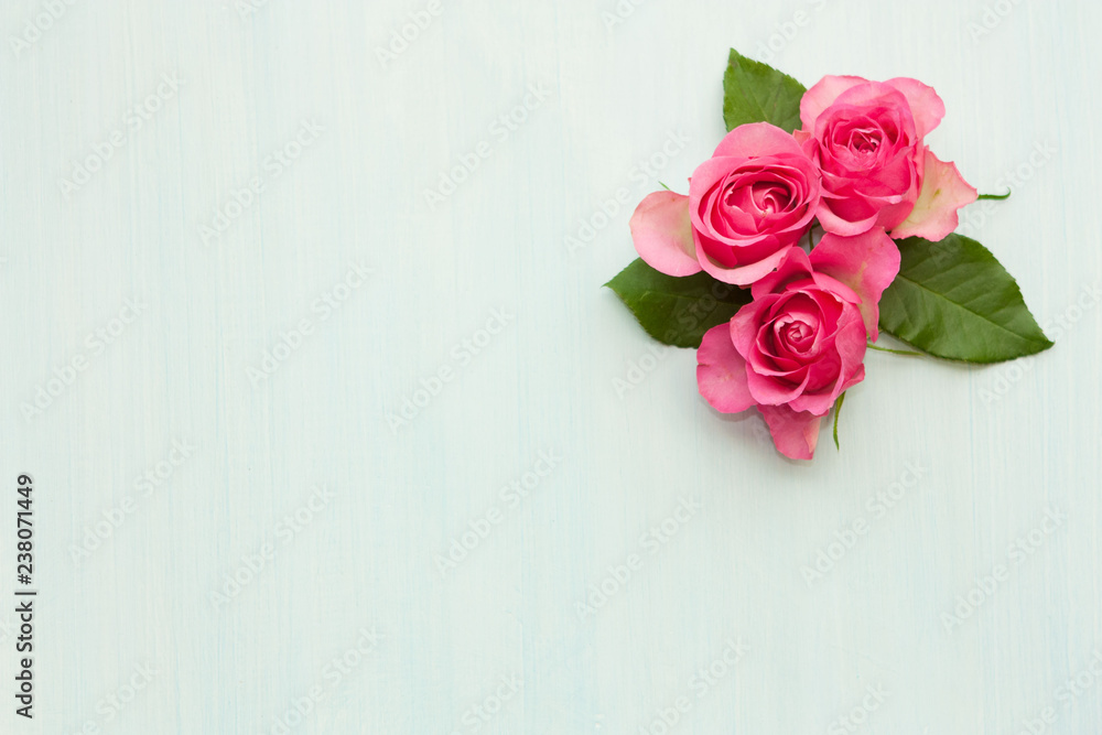Floral frame made of pink roses on light background. Floral frame made of pink roses on light background.