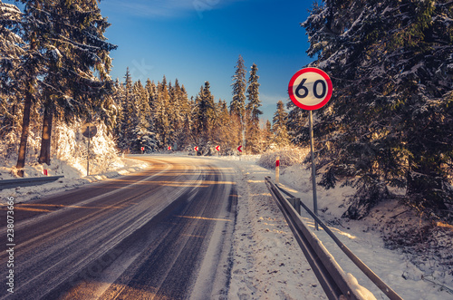 Winter road curve, snowy mountain landscape