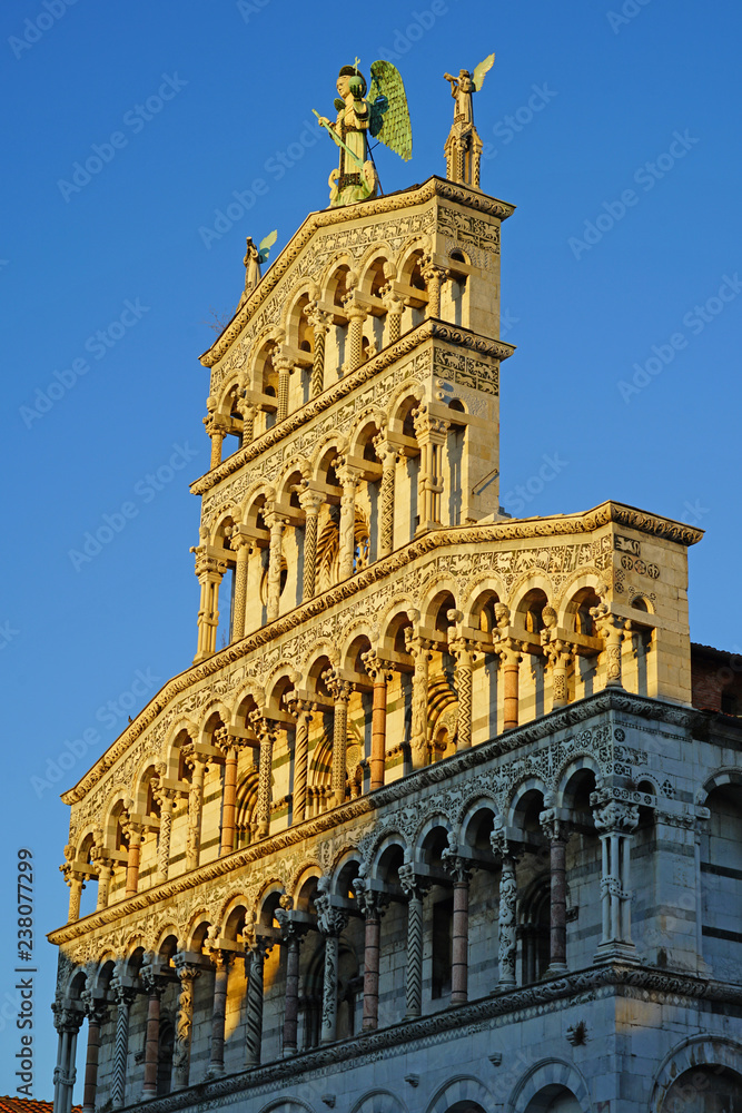 View of the landmark San Michele in Foro, a historic Romanesque Roman Catholic basilica in Lucca, a historic city in Tuscany, Central Italy