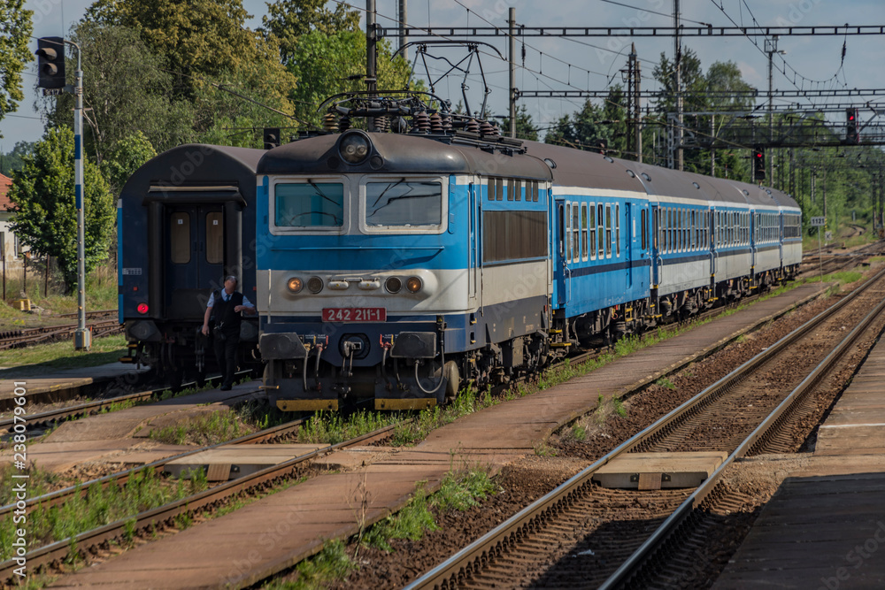 Blue electric train in Cicenice station in spring sunny day Blue electric train in Cicenice station in spring sunny day