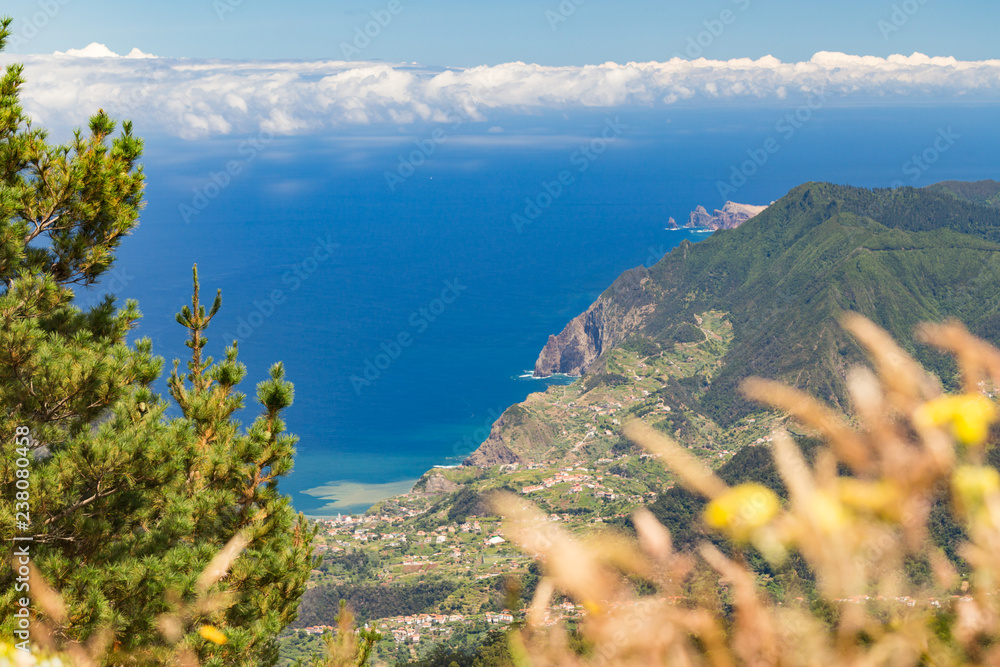 View of the ocean coast from the tops of the mountains on the island of Madeira, Portuga