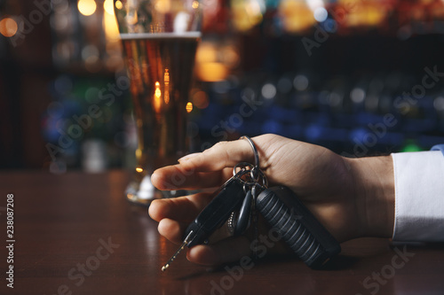 Do not drink and drive  Cropped image of drunk man talking car keys