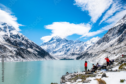 2018, Oct 13, New Zealand, Mount Cook National Park, Group of traveler enjoying with a beautiful view covered with snow after a snowy day.