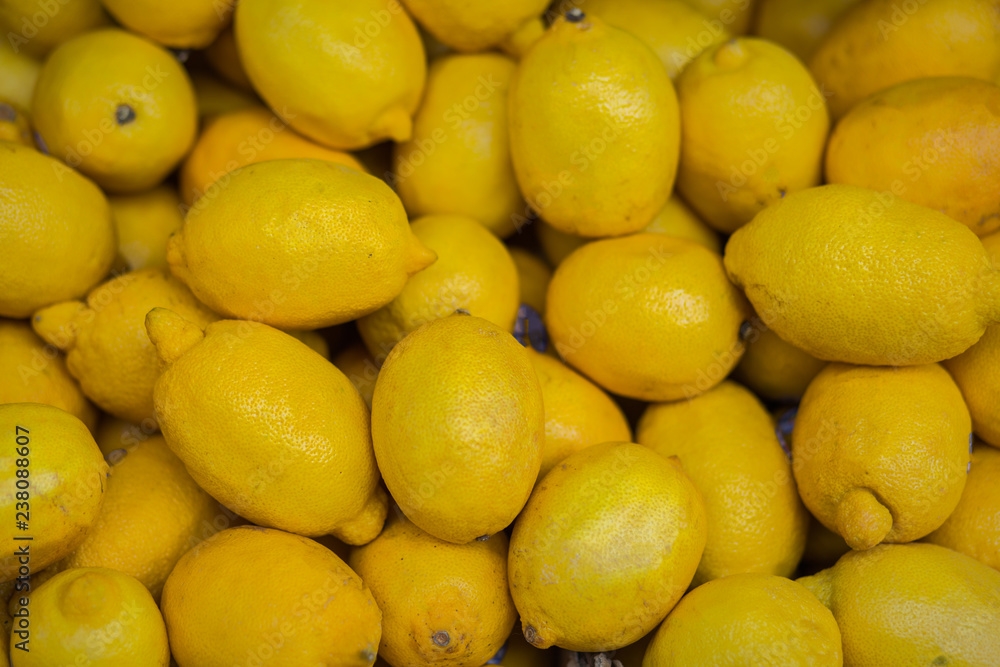 Pile of lemons background.