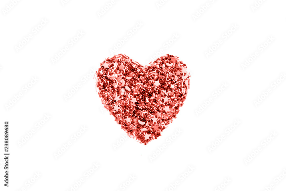 Heart shaped confetti toned Living Coral color of the 2019 year.
