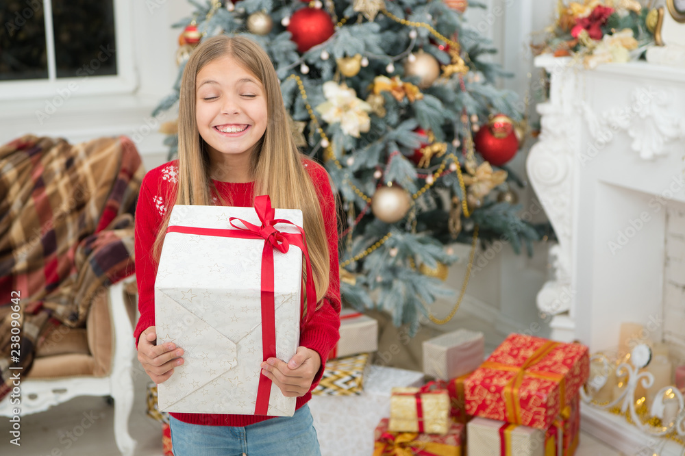 Christmas preparation. Happy new year. Winter. Christmas tree and presents. xmas online shopping. Family holiday. The morning before Xmas. Little girl. Child enjoy the holiday Christmas preparation. Happy new year. Winter. Christmas tree and presents. xmas online shopping. Family holiday. The morning before Xmas. Little girl. Child enjoy the holiday