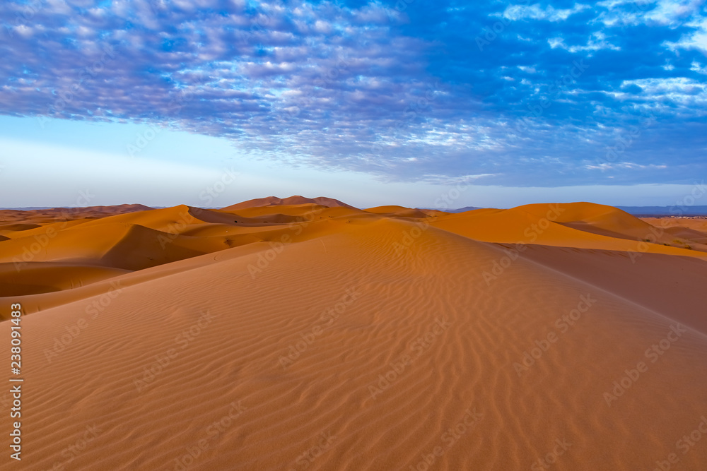 Beautiful colorful sunset in Erg Chebbi Dunes, Sahara Desert, Merzouga, Morocco, Africa