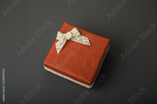 Gift box on a dark background. Top view with place for text.