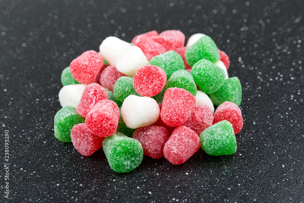 Pile of red green white jellied holiday drops Pile of red green white jellied holiday drops