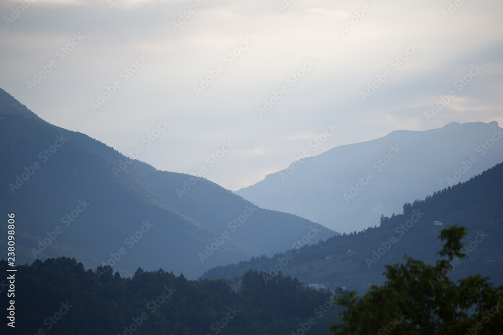Naklejka premium mountains in fog