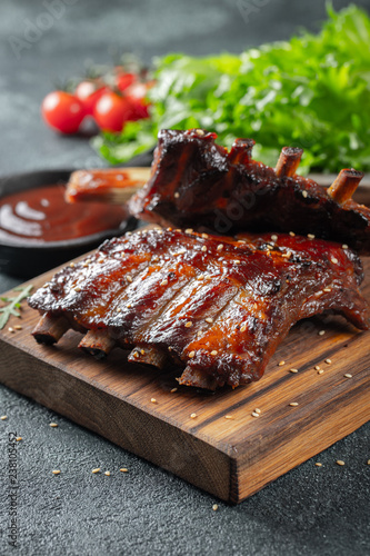 Bild auf Leinwand Closeup of pork ribs grilled with BBQ sauce and caramelized in honey