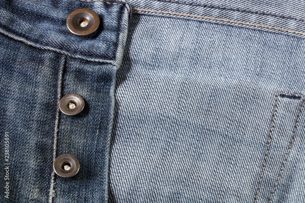 buttons on blue jeans. Nice for a background. buttons on blue jeans. Nice for a background.