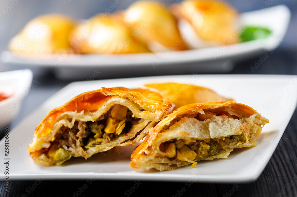 Empanada -dumplings stuffed with meat and vegetable. Empanada -dumplings stuffed with meat and vegetable.