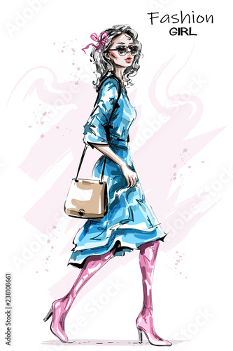 Hand drawn beautiful young woman with bag. Stylish elegant girl in dress. Fashion woman look. Sketch.