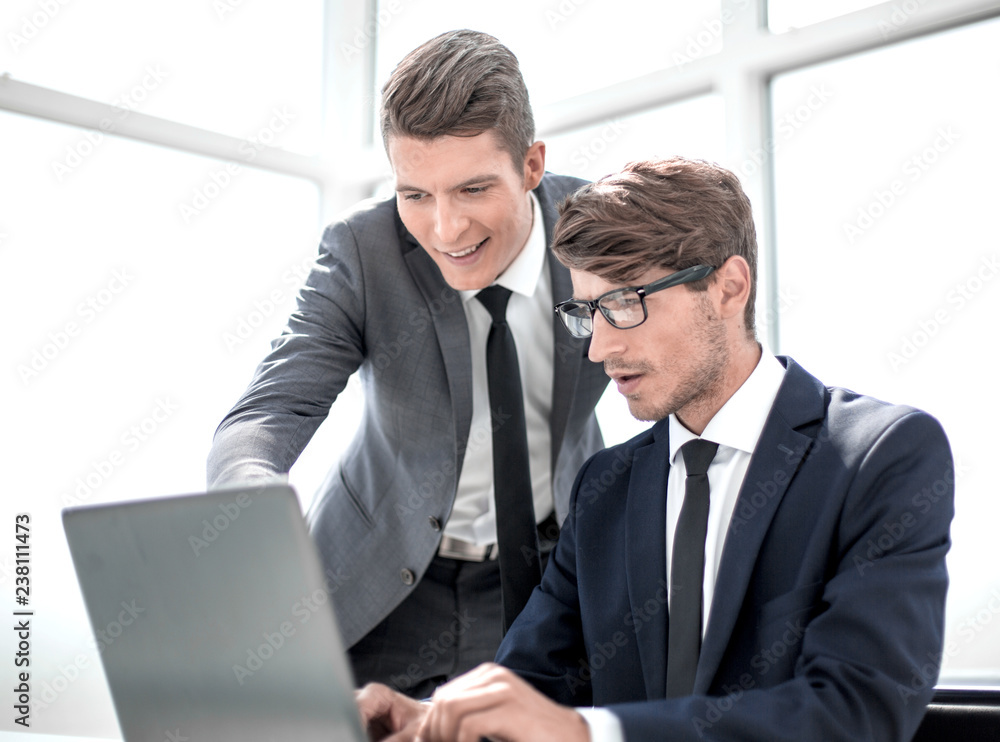 employees use a laptop to check the information they need employees use a laptop to check the information they need
