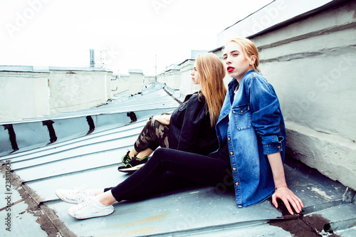 two cool blond real girls friends making selfie on roof top, lif photo