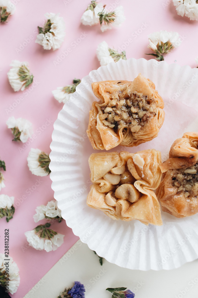Baklava sweet dessert. Pastry made of layers of filo filled with chopped nuts and sweetened and held together with syrup or honey