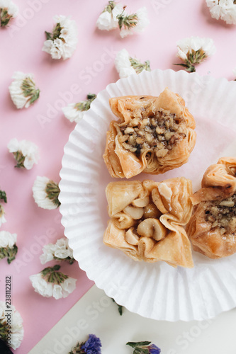 Baklava sweet dessert. Pastry made of layers of filo filled with chopped nuts and sweetened and held together with syrup or honey
